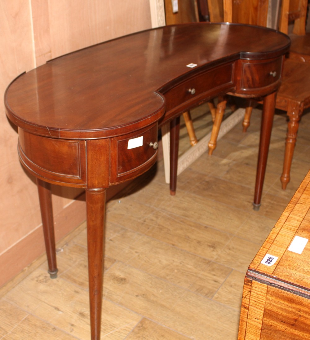 A mahogany kidney shaped dressing table, W.120cm D.50cm H.77cm